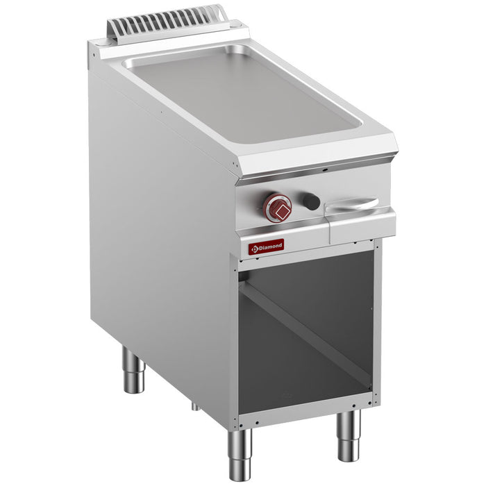 Plaque de cuisson gaz lisse module 1/2 Diamond, vue d'une armoire ouverte, montrant la surface de cuisson en acier inoxydable.