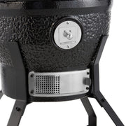 Barbecue Kamado premium de 18 pouces Maxima, en céramique noire avec ventilation, prêt à cuisiner en extérieur.