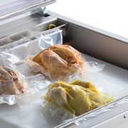 Machine à emballer sous vide Maxima avec joint de 70 cm, chambre de 72x61x21,5 cm pour emballage sous vide efficace.