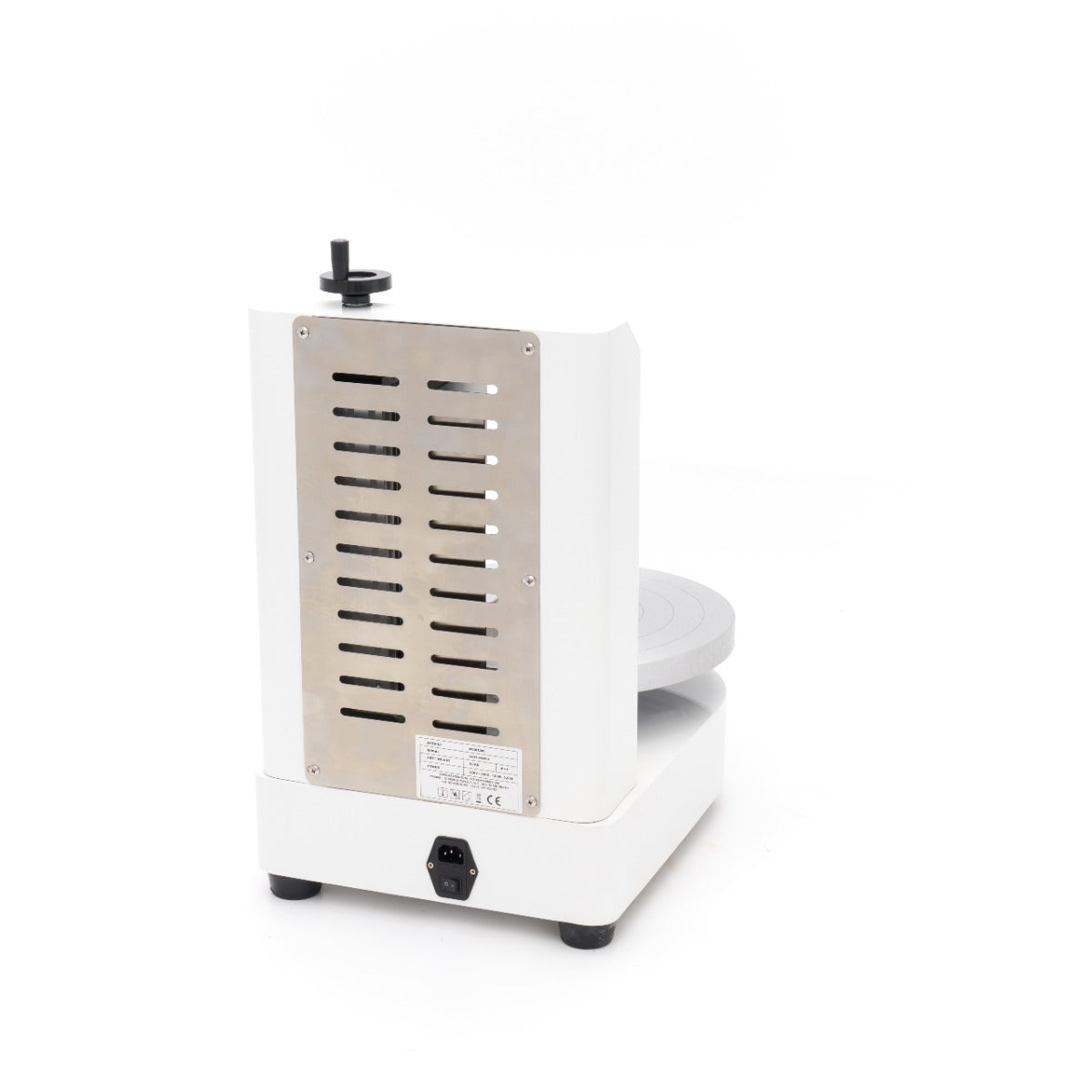 Machine à décorer les gâteaux Maxima, diamètre 36,4 cm, en blanc, visible avec accessoires pour décoration de pâtisserie.