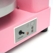 Machine à décorer les gâteaux Maxima, diamètre 36,4 cm, en rose, avec accessoires pour décoration de pâtisserie.