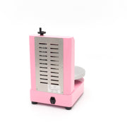 Machine à décorer les gâteaux Maxima, diamètre 36,4 cm, en rose, utilisée pour la décoration de pâtisseries et gâteaux.
