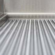 Fourchette de cuisson induction Maxima 700, plancha à induction double 5 000 W, surface lisse et rainurée visible en image