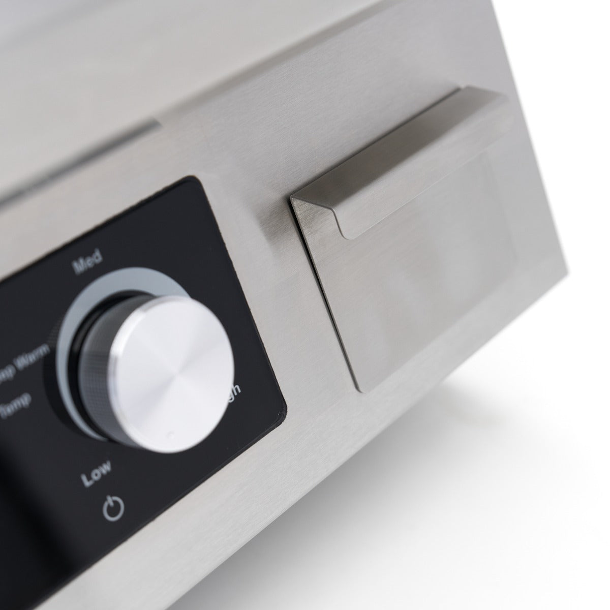 Fourchette de cuisson à induction Maxima 700, plancha lisse 5 000 W pour cuisson simple et efficace.