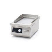 Fourchette de cuisson à induction Maxima 700, plancha lisse de 700W pour cuisson simple et efficace.