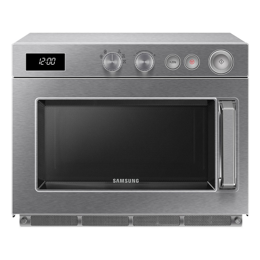 Four micro-ondes en inox Diamond avec contrôle mécanique, puissance de 1850 W et capacité de 26 litres, mode d'emploi visible.