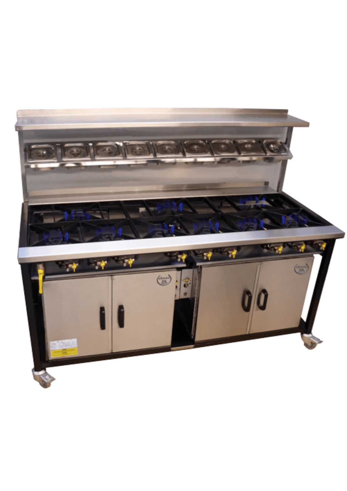 Cuisinière indienne professionnelle SHAAN à gaz avec 5 brûleurs, surface en acier inoxydable et option supplémentaire visible.