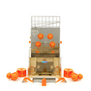 Presse-agrumes électrique Maxima, presse-orange électrique de 8 kg, capacité pour 25 jus par minute, affichée sur l'image.