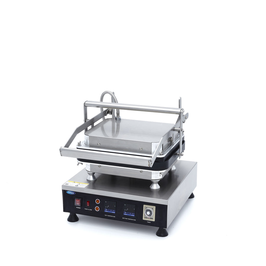 Machine à tartelettes Maxima avec différents moules en acier inoxydable, prête à préparer des tartelettes maison.