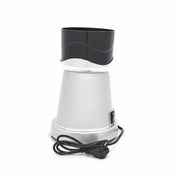 Presse-agrumes électrique Maxima, presse orange 32 L/h, verre de 12,5 cm, en action avec orange fraîche.