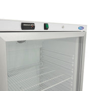 Réfrigérateur Maxima blanc de 600 L avec porte en verre, intérieur spacieux et design moderne visible sur l'image.