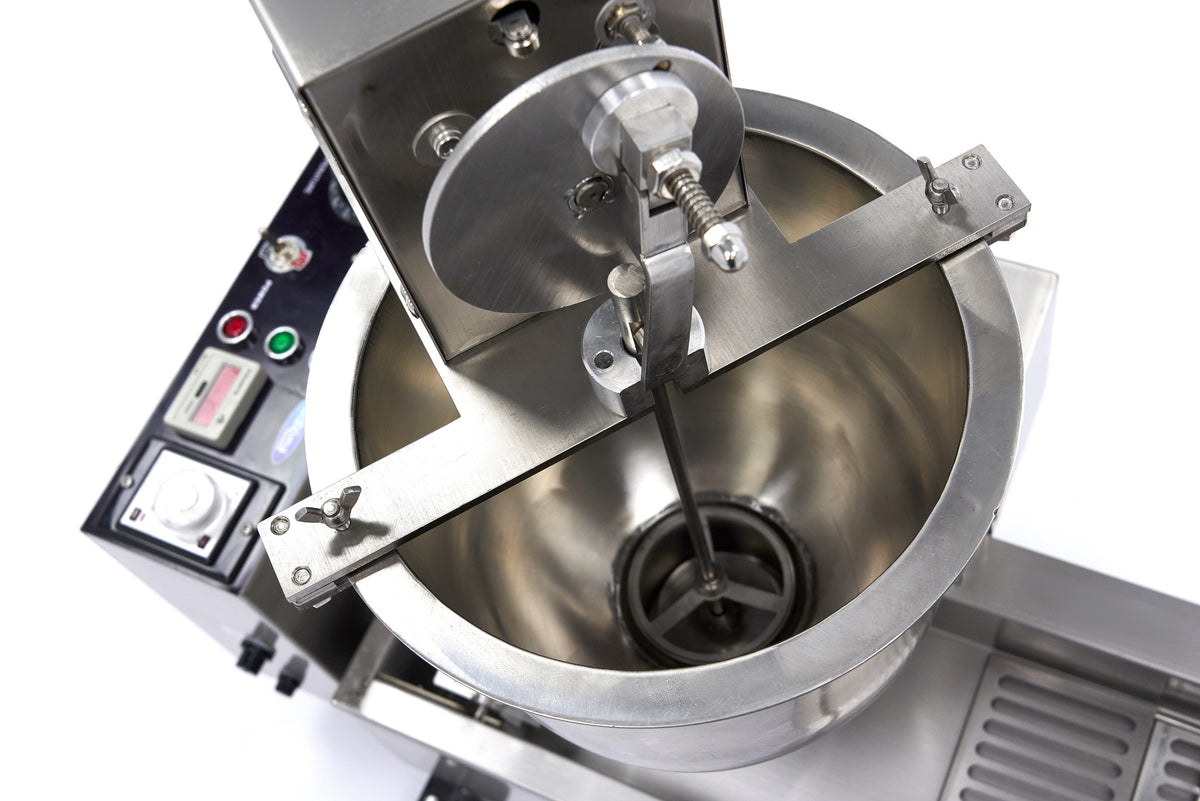 Appareil à donuts Maxima automatique avec friteuse et système de retournement, capable de produire 450 donuts par heure